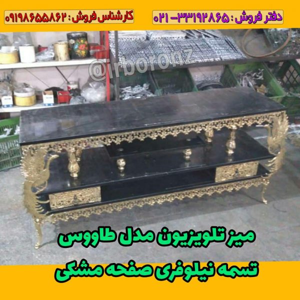 میز تلویزیون برنزی دو کشو مدل طاووس صفحه مشکی تسمه نیلوفری